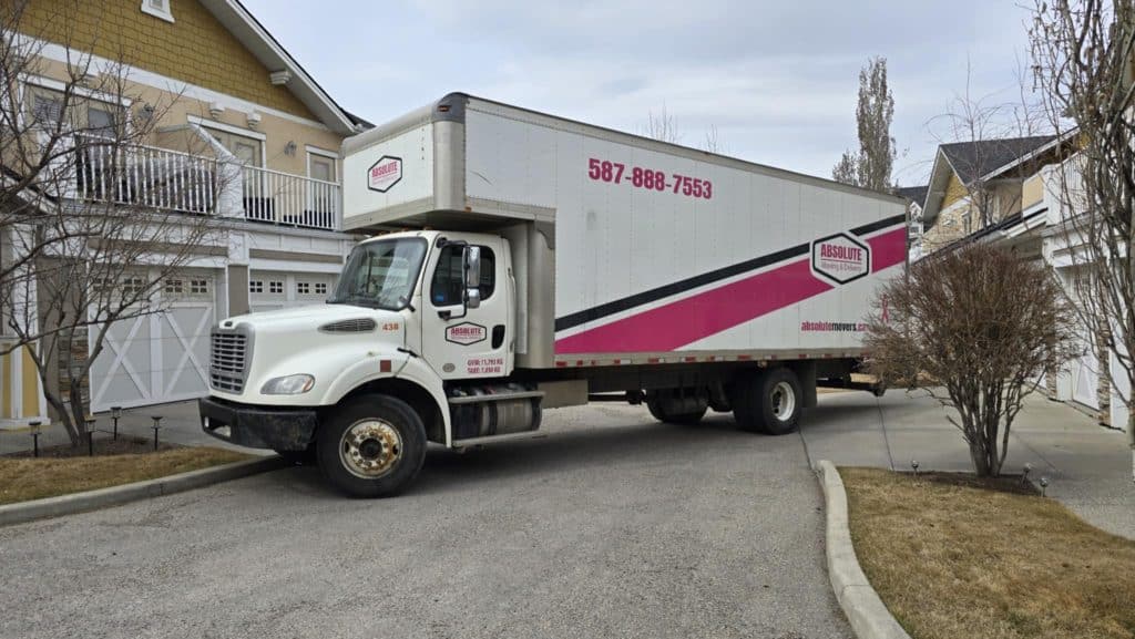 Absolute Moving & Delivery truck parked outside